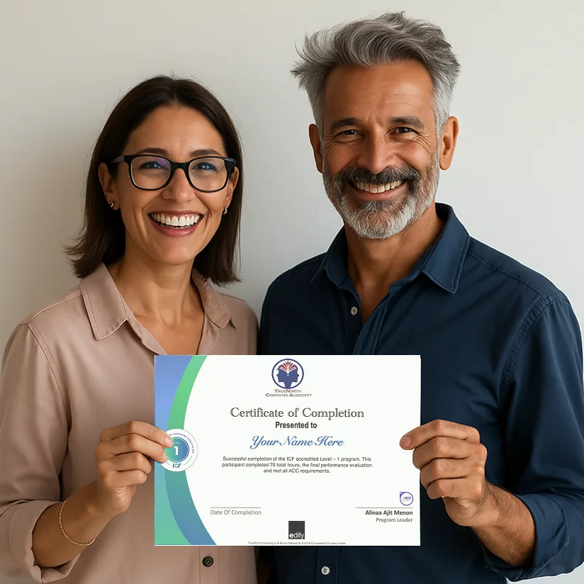 two people holding an ICF certificate from truenorthcoachingacademy.com